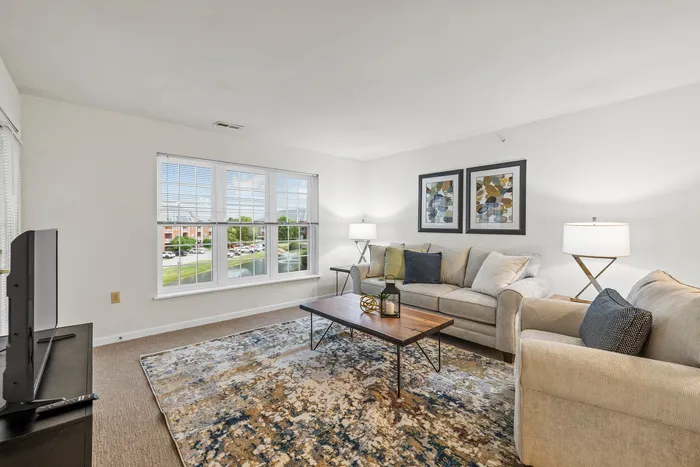 Open-concept living room at Barrington Place Apartments in Madison, Wisconsin.