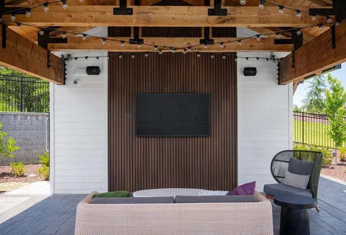 Outdoor TV lounge with comfortable seating at Echelon at Charlotte