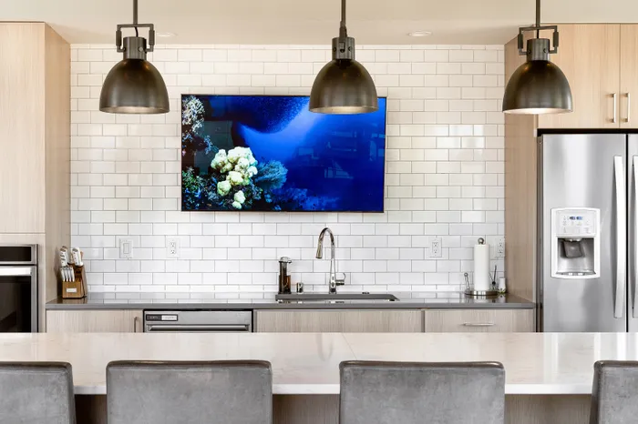 Luxury clubhouse kitchen with stainless steel appliances at Seasons at Orchard Hills in Oak Creek, Wisconsin.