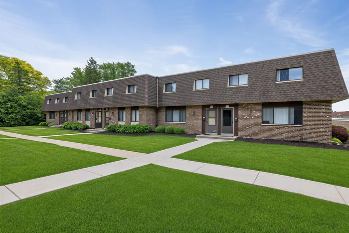 Modern apartment building at Stone Point Apartments in Menomonee Falls, WI