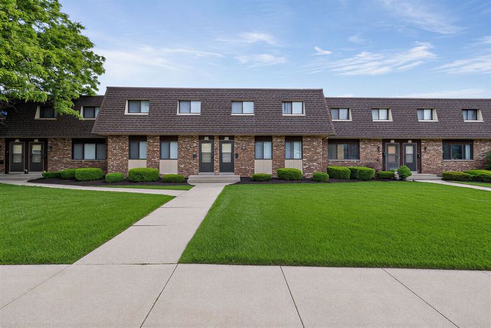 Front exterior of Stone Point Apartments in Menomonee Falls, WI