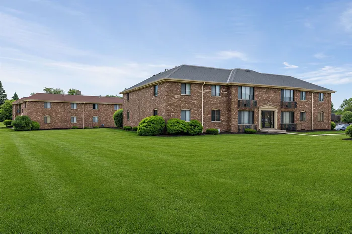 Landscaped exterior at Stone Point Apartments in Menomonee Falls, WI