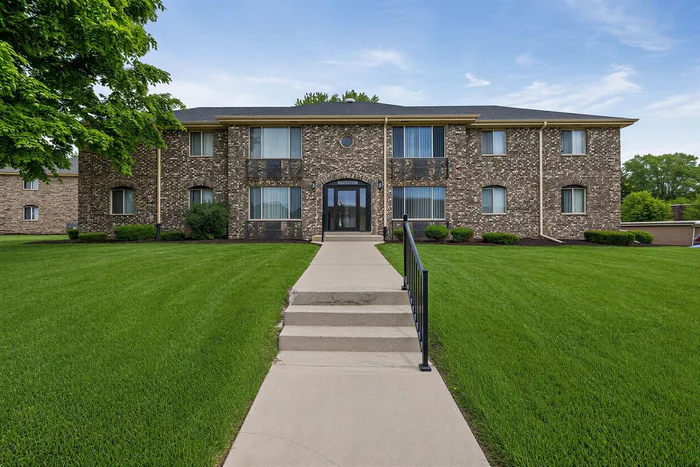 Streetside view of Stone Point Apartments in Menomonee Falls, WI