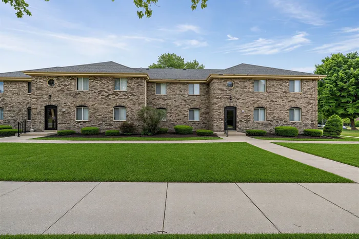 Wide exterior view of Stone Point Apartments in Menomonee Falls, WI
