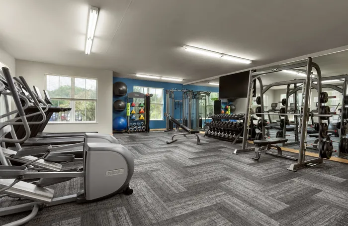 24-hour fitness center at Elan Apartments in Fitchburg, Wisconsin equipped for strength and cardio workouts.