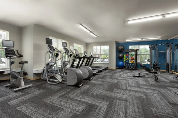 24-hour fitness center at Elan Apartments in Fitchburg, Wisconsin equipped for strength and cardio workouts.