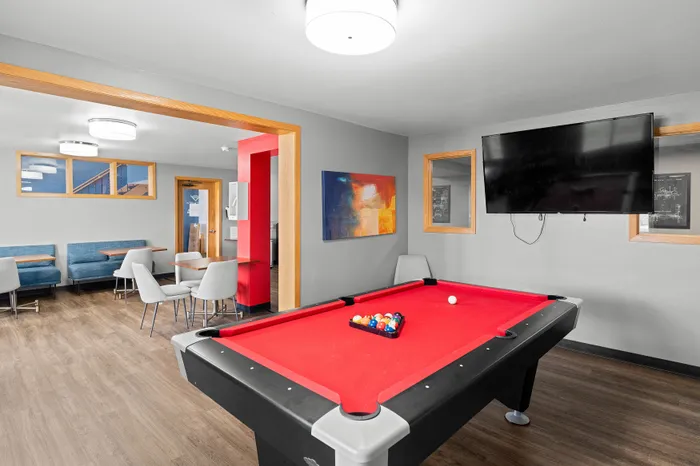 Resident clubhouse at Valley View Apartments featuring shared community entertainment area.