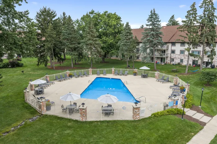 Aerial view of the outdoor swimming pool and pool deck at Valley View Apartments.