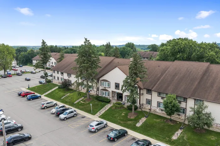 Apartment building exterior and landscaped grounds at Valley View Apartments.