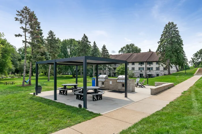 Resident outdoor seating and grilling area at Valley View Apartments.