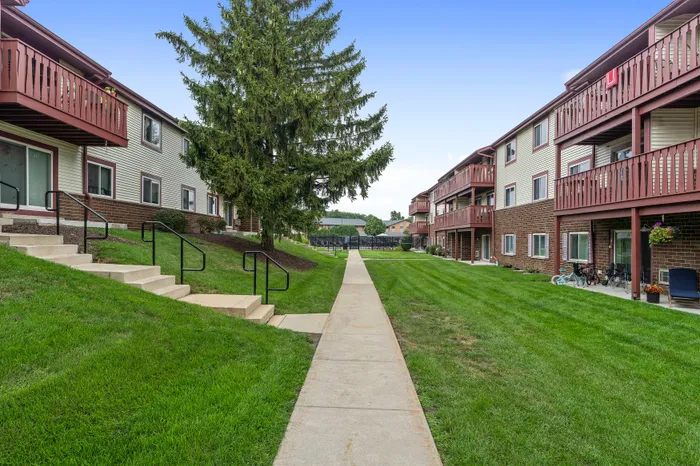 Exterior of Ridge View Apartments with landscaped outdoor areas.
