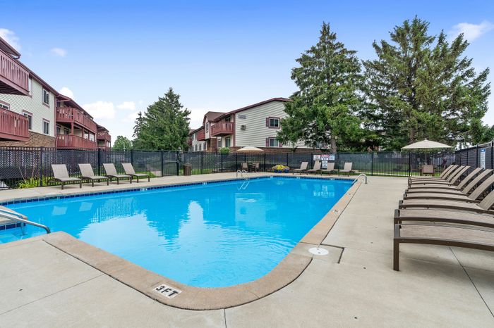 Sparkling outdoor swimming pool at Ridge View Apartments.
