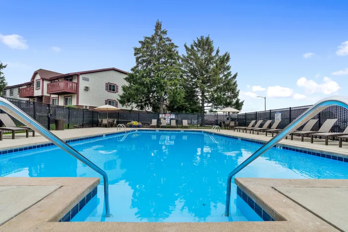 Resident outdoor swimming pool at Ridge View Apartments.