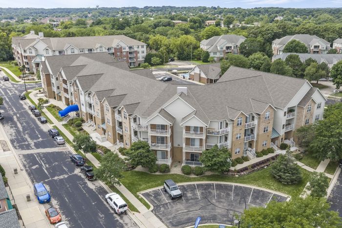 Residential apartment building exterior at The Landmark at Hatchery Hill.