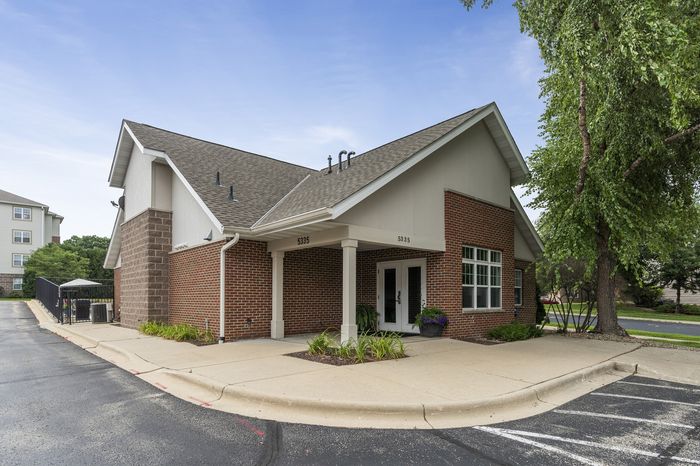 Exterior of an apartment building at The Landmark at Hatchery Hill.