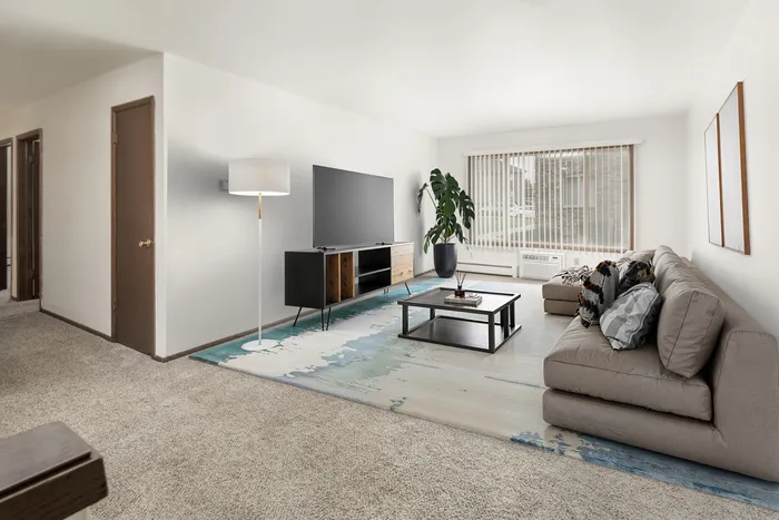 Living room at Stone Point Apartments with open layout and natural light.