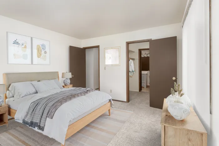 Bedroom at Stone Point Apartments offering comfortable space and natural light.