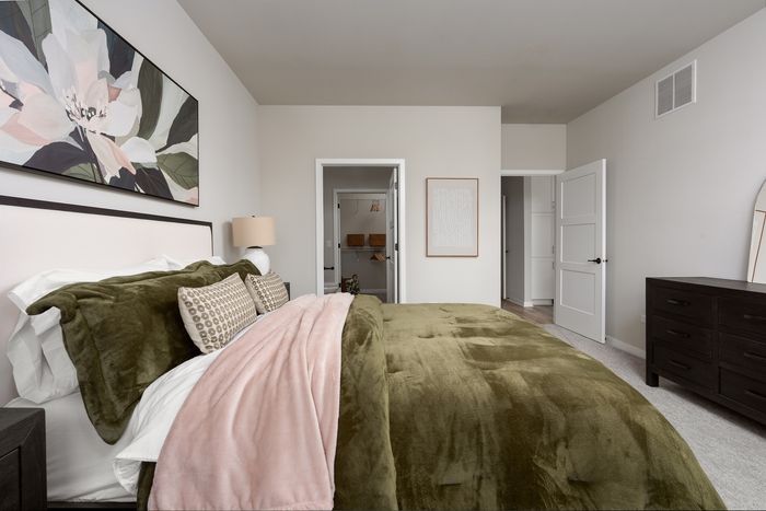 Bedroom at Seasons at Elgin Apartments.