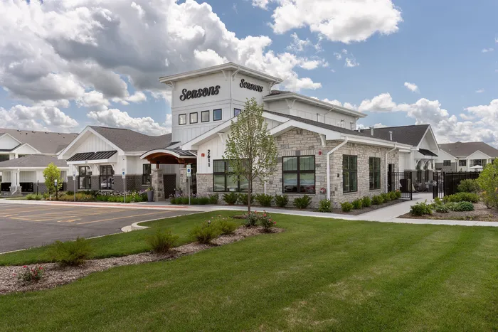 Clubhouse exterior at Seasons at Elgin Apartments.