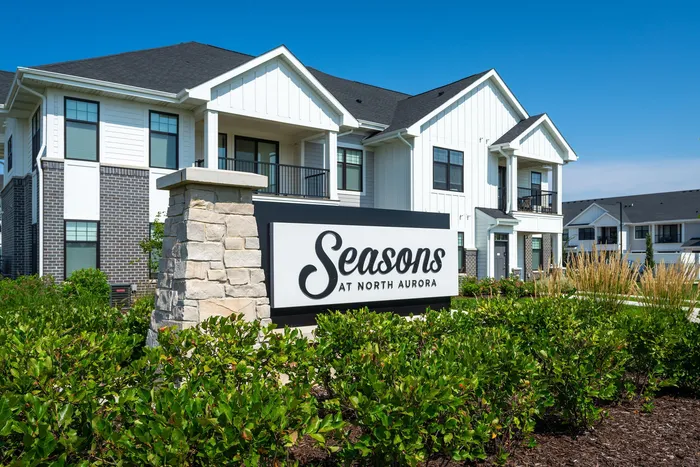 Seasons at North Aurora building signage for the community.
