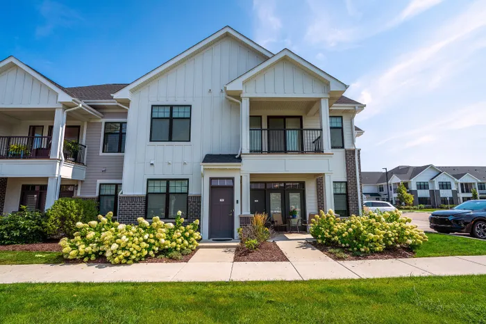 Apartment building exterior at Seasons at North Aurora.