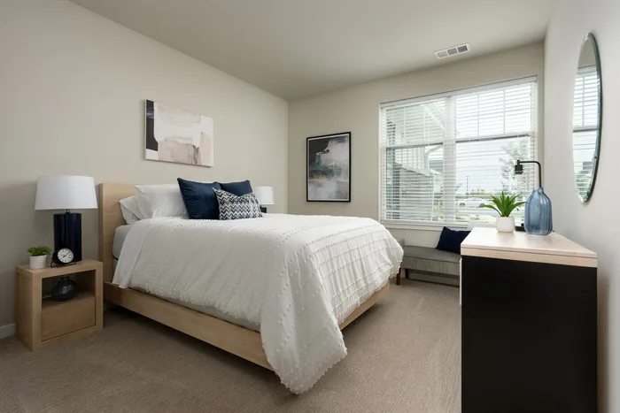 Bedroom at Seasons at North Aurora Apartments.