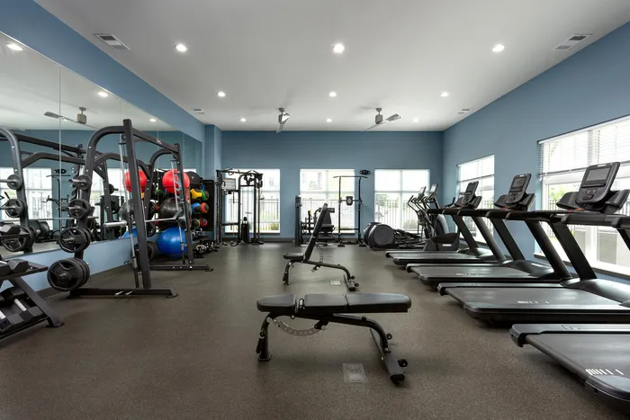 Fitness center at Seasons at North Aurora Apartments.