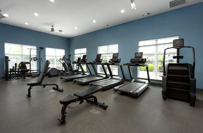 Fitness center at Seasons at North Aurora Apartments.
