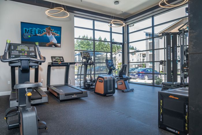 1500 Orchard Fitness Center Overlooking the Pool l Luxury Apartments for Rent in Tacoma, WA l 1500 Orchard