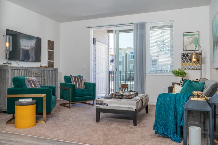 Model Living Room + Balcony l Luxury Apartments for Rent in Tacoma, WA l 1500 Orchard
