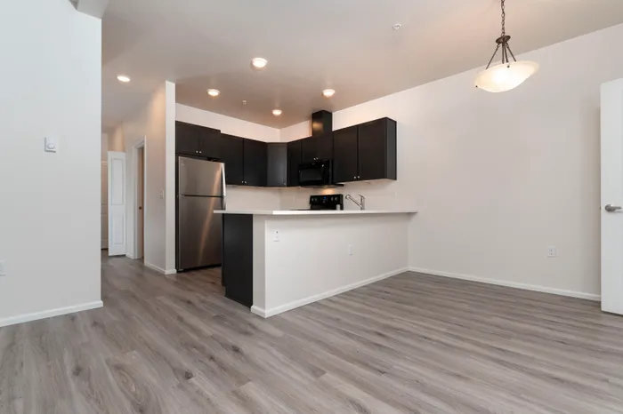 2x2 Deluxe Kitchen + Dining Room l Luxury Apartments for Rent in Tacoma, WA l 1500 Orchard