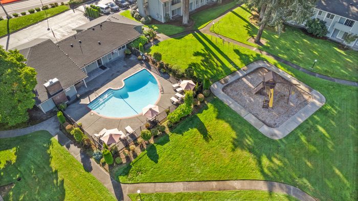 Pool + Playground Overview l 1 and 2 Bedroom Apartments in University Place, WA l Park Place Apartments