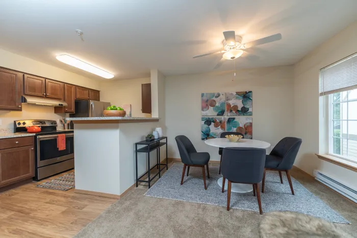 Model Kitchen + Dining Room l Apartments for Rent in Tacoma, Wa l Tudor Village Apartments