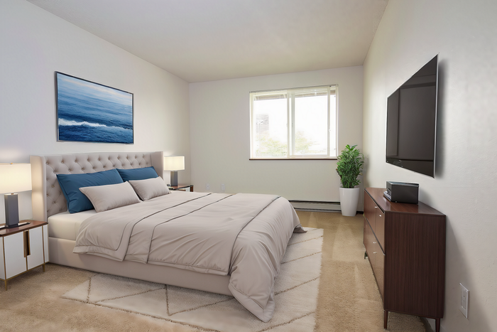 Elegant bedroom with a plush bed, modern decor, large window, and stylish furnishings.