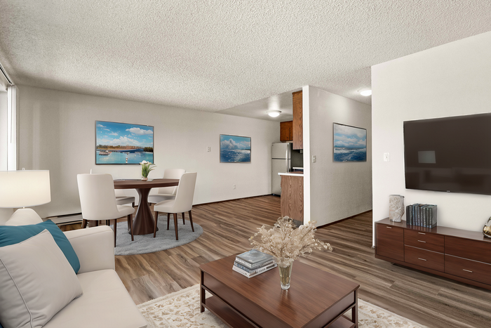 Sophisticated open-concept living room with modern furnishings and hardwood floors.