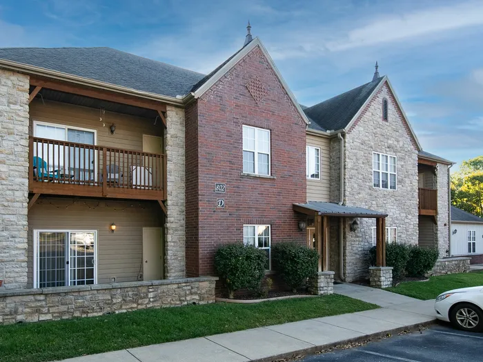 Martin Riley Apartments feature traditional brick and stone exteriors.