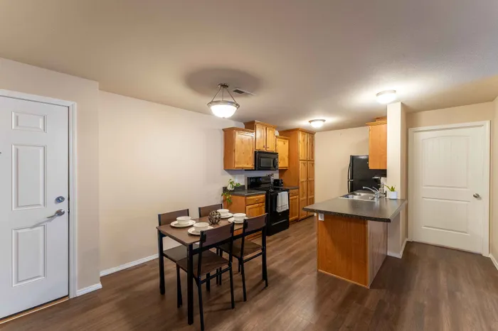 The-Abbey-Apartment-Homes-Springfield-Missouri-Furnished-Two-Bedroom-C-Phase-2-Dining-Room-Kitchen-View