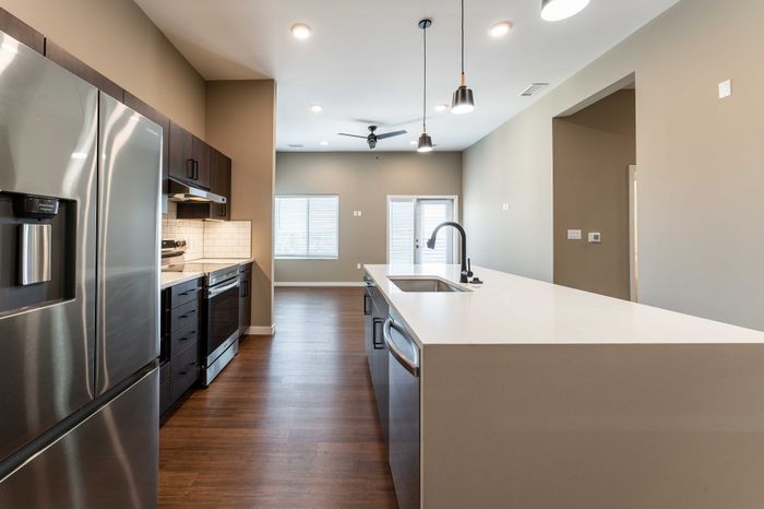 Heritage-Apartments-Springfield-Missouri-Galahad-Two-Bedroom-Kitchen-Living-Room-View