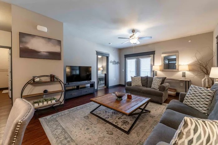 Township-28-Apartments-Springfield-Missouri-Furnished-Three-Bedroom-Living-Room-Patio-View