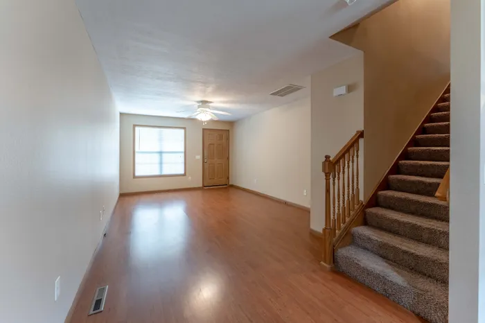 Oakwood-Heights-Townhomes-Republic-Missouri-Phase-One-Three-Bedroom-Living-Room-Staircase