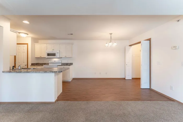 Battlefield-Park-Apartments-Springfield-Missouri-Three-Bedroom-Living-Room-Dining-Space