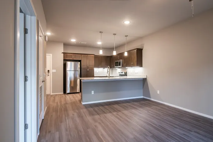 Promenade-Commons-Apartments-Rogers-Arkansas-Phase-Two-One-Bedroom-With-Backyard-Living-Room-Kitchen