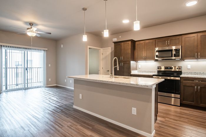 Promenade-Commons-Apartments-Rogers-Arkansas-Phase-Two-Two-Bedroom-Living-Room-Kitchen
