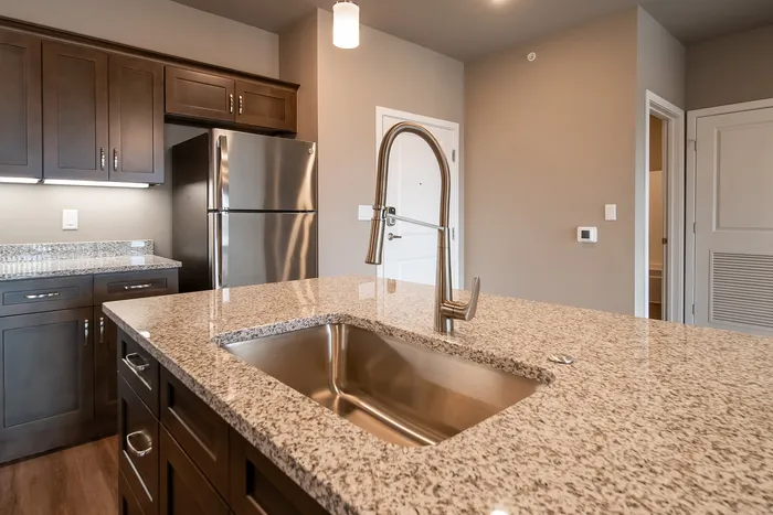 Promenade-Commons-Apartments-Rogers-Arkansas-Phase-Two-Two-Bedroom-E-Kitchen-Island-Sink