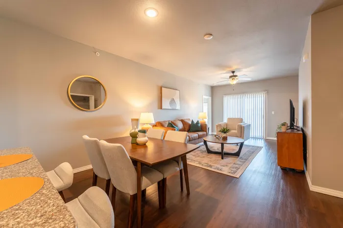 Verandas-Apartments-Springfield-Missouri-Furnished-Two-Bed-Two-Bath-Dining-Space-Living-Room-Patio-Doors
