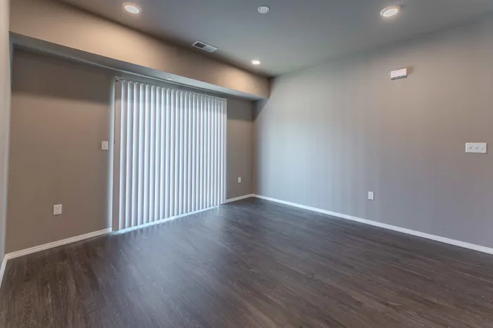 Veranda-Vistas-55-Plus-Apartments-Springfield-Missouri-Two-Bedroom-Living-Room-Balcony-Doors