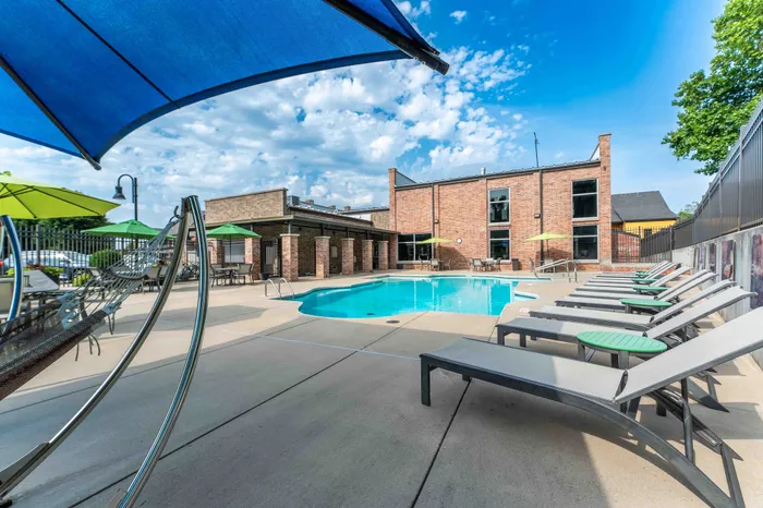 Township-28-Apartments-Springfield-Missouri-Amenities-Saltwater-Pool-Side-Lounge-Chairs