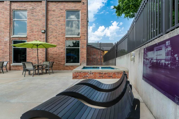 Township-28-Apartments-Springfield-Missouri-Amenities-Saltwater-Hot-Tub-Lounge-Chairs