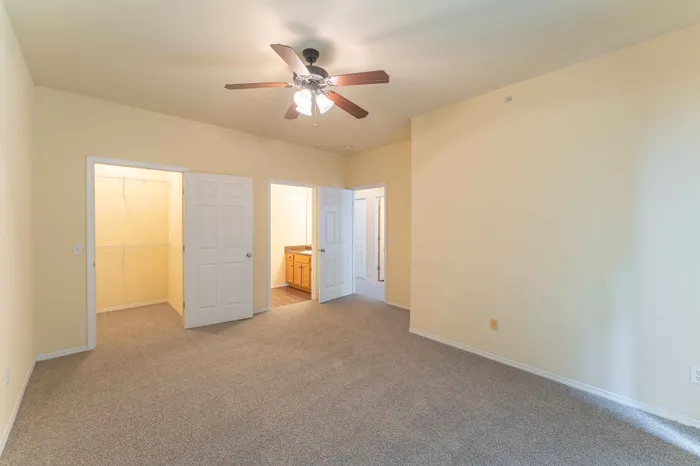 Martin-Riley-Apartment-Homes-Springfield-Missouri-Four-Bedroom-Primary-Bedroom-Closet-Bathroom-Entrance