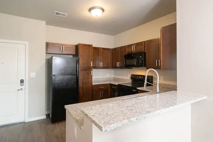 Crescent-Falls-Apartments-Joplin-Missouri-One-Bedroom-Kitchen-Entrance